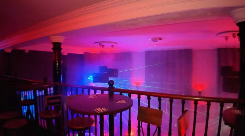 balcony and dancefloor at the swingers club Le Boudoir 