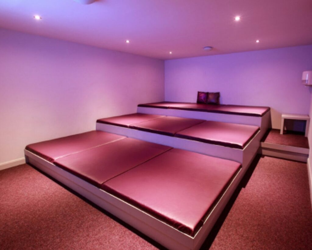 Three tiers bed in the adult playroom at Quest Swingers Club