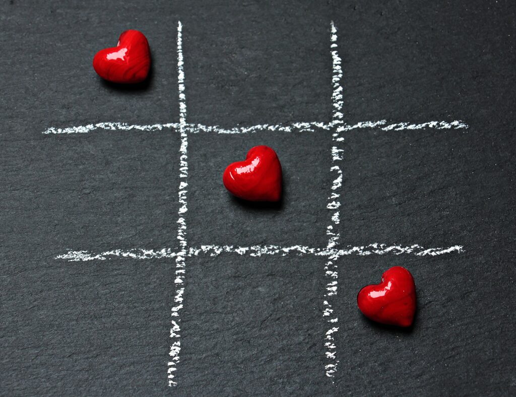 three hearts represanting a three persons relationship among bisexual swingers